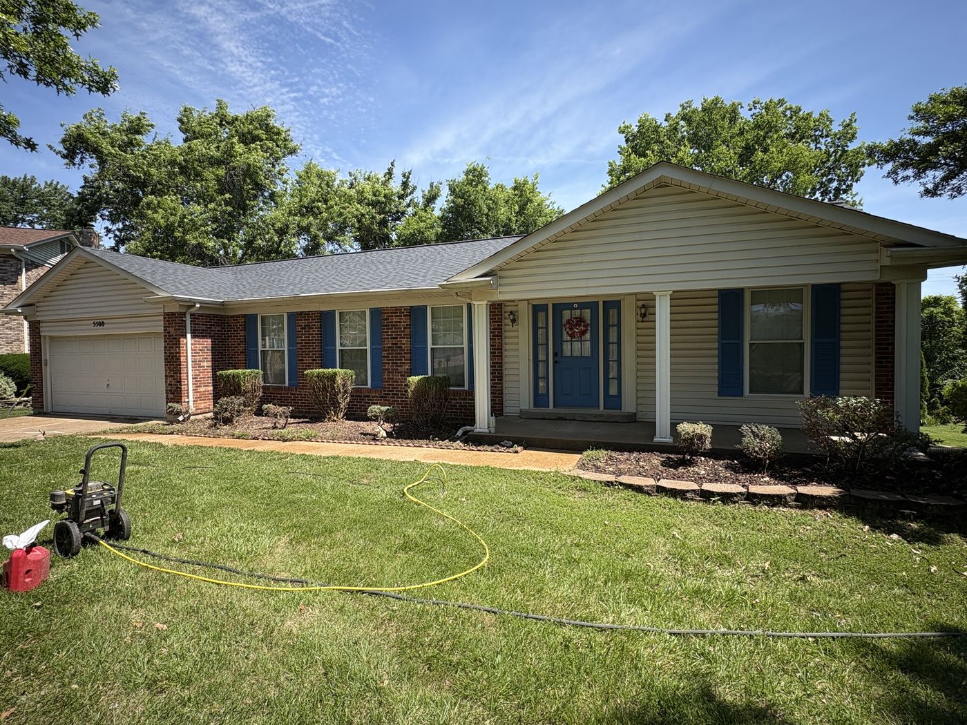 Driveway and walkway after professional cleaning, brightened concrete, South County St. Louis