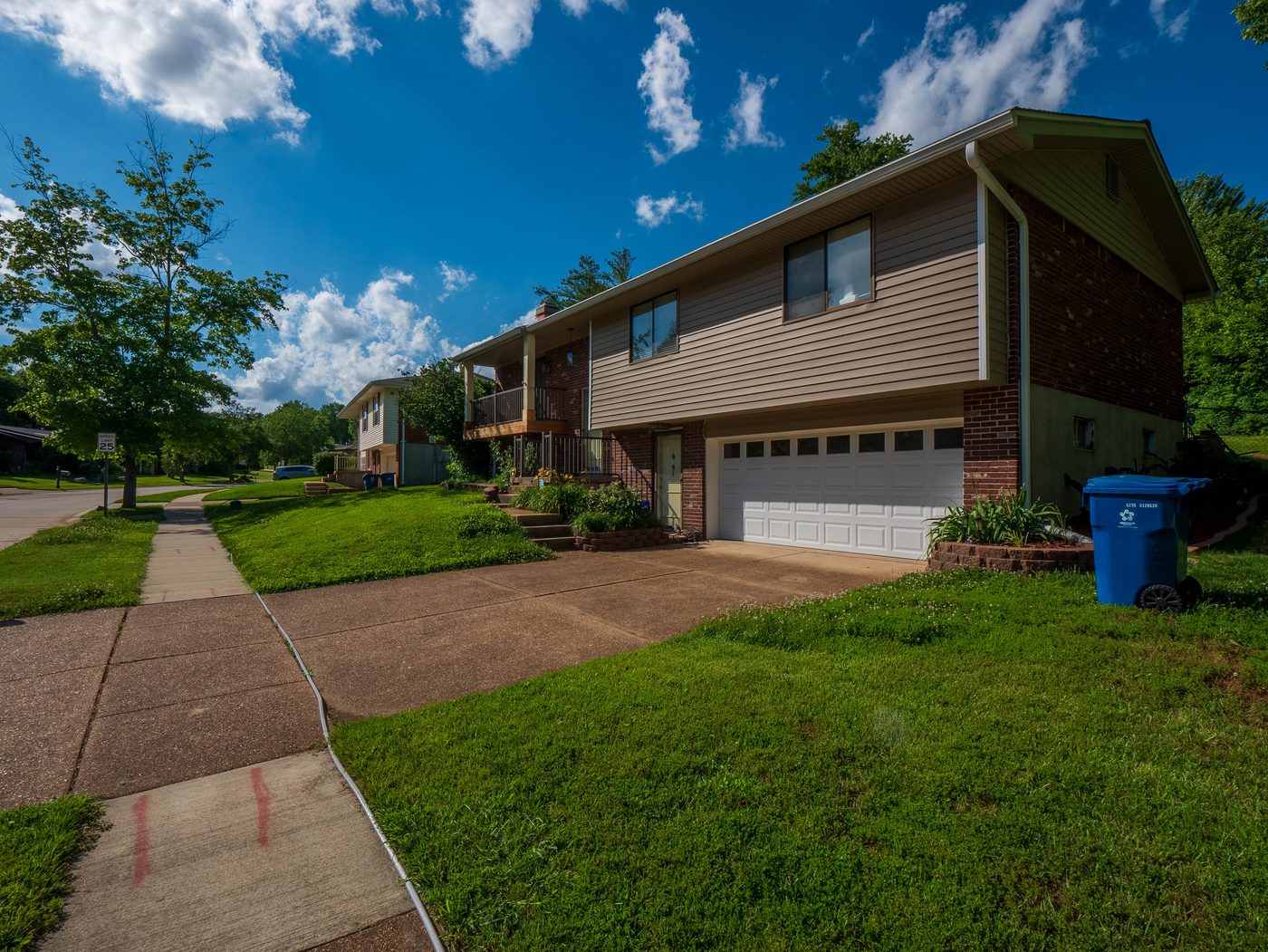 Rental property driveway before professional cleaning, South County St. Louis