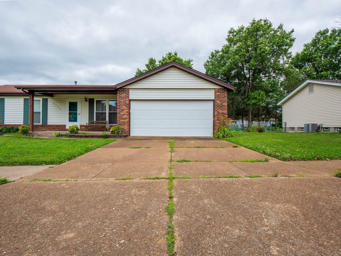 Driveway before professional pressure washing, South County St. Louis