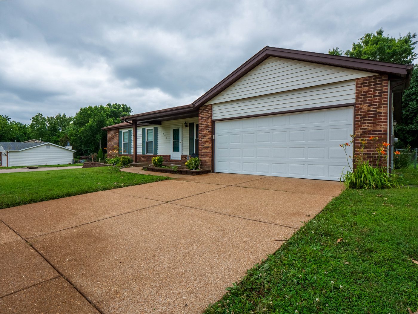 Rental property exterior after seasonal maintenance, South County St. Louis