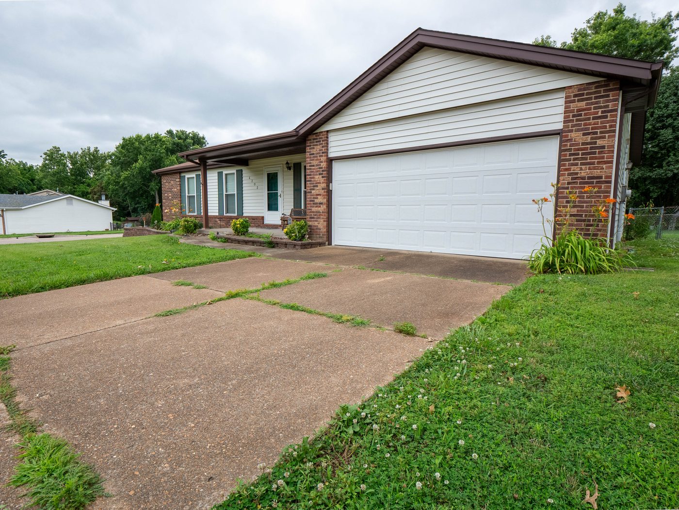 Rental property exterior before seasonal maintenance, South County St. Louis